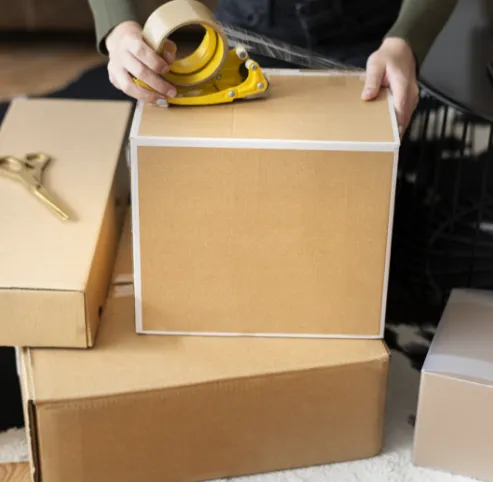 men wrapping box
